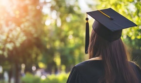 Student in graduation cap and gown