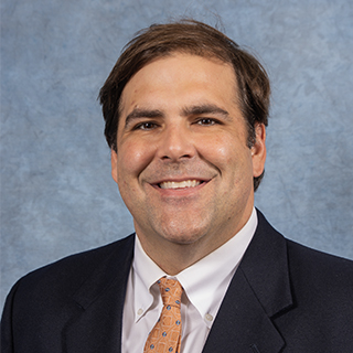Portrait of Executive Director, Kell Smith